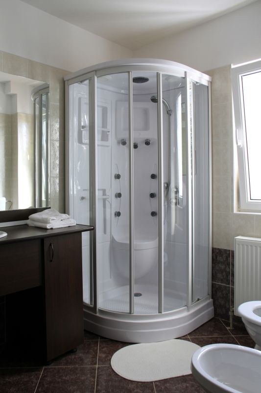 Bathroom with Installed Glass Doors